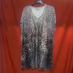 Jenifer Lopez batwing dress. Lined.